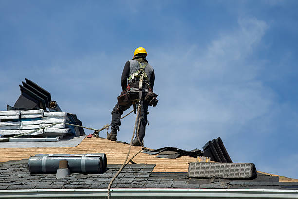 Professional Gutter Installation technician working in Massapequa, NY